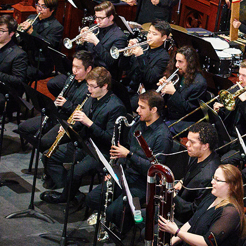 photo of an ensemble of wind players