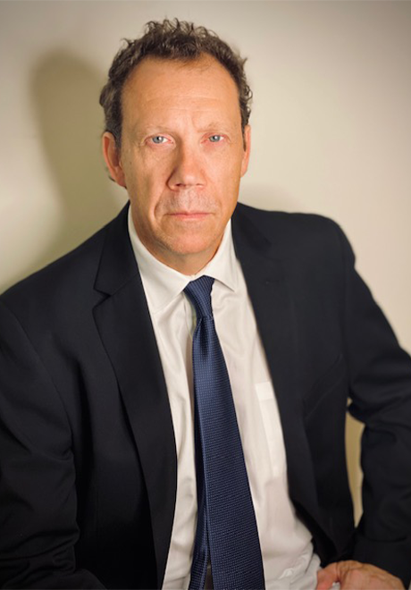 Marcus Giamatti headshot, wearing a suit and tie