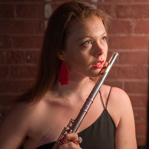 Hannah Tobias headshot with flute