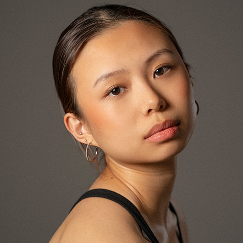Emily Wang headshot; wearing black top