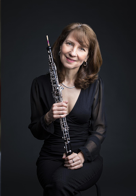 Nancy Dimock holding an oboe