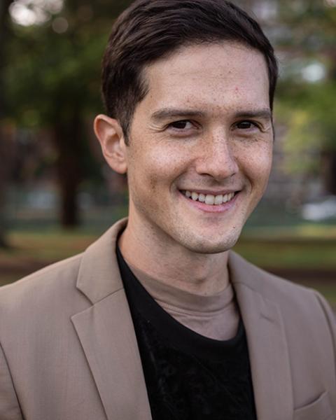 Joshua Tuason headshot, smiling