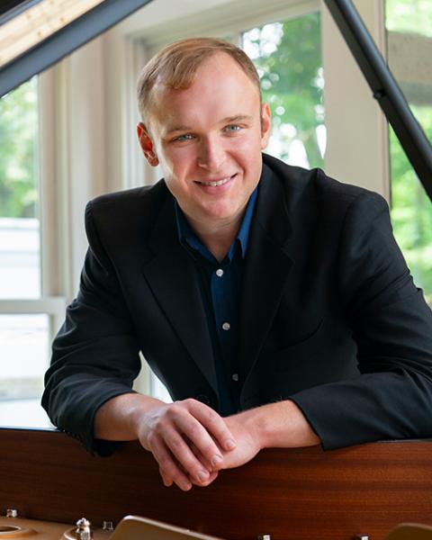Headshot of Alexander Crosett