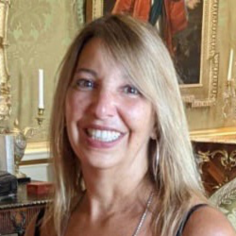 Sandra Musella smiling.