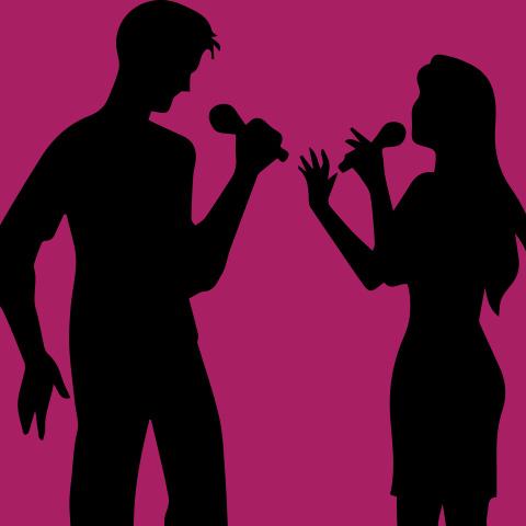 Silhouette of two singers