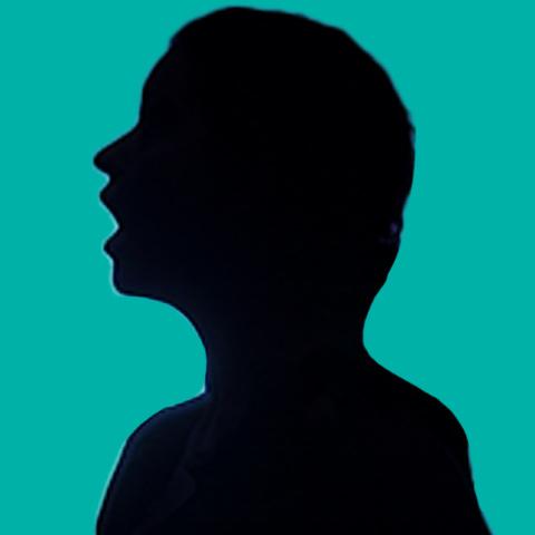 Silhouette of a person singing