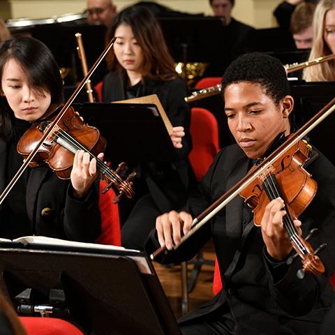students playing string instruments