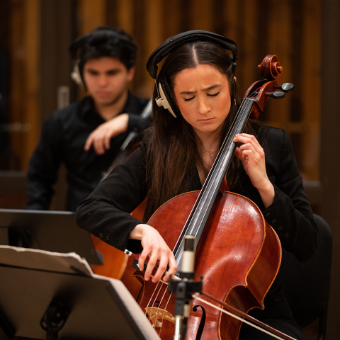 Boston Conservatory students Elaina Spiro, foreground, and Andrés Celis, background, recorded works by screen scoring students at Berklee College of Music's flagship recording studio, the Power Station at Berklee NYC.
