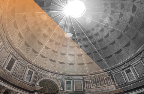 The sun shines through a roman style ceiling dome