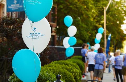 Balloons that say Boston Conservatory at Berklee are displayed outside of conservatory buildings during orientation