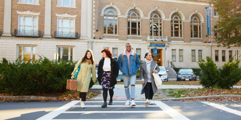 Four students walking outside of 8 Fenway on Boston Conservatory's campus.