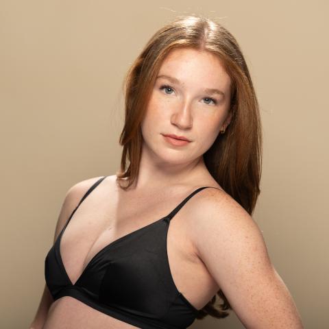 Cammie Coleman headshot: posing in black bra