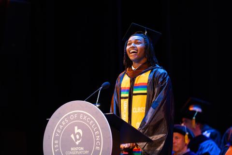 Commencement senior speaker Joshua Alexander Griffin (BFA '26, musical theater) addresses the audience.